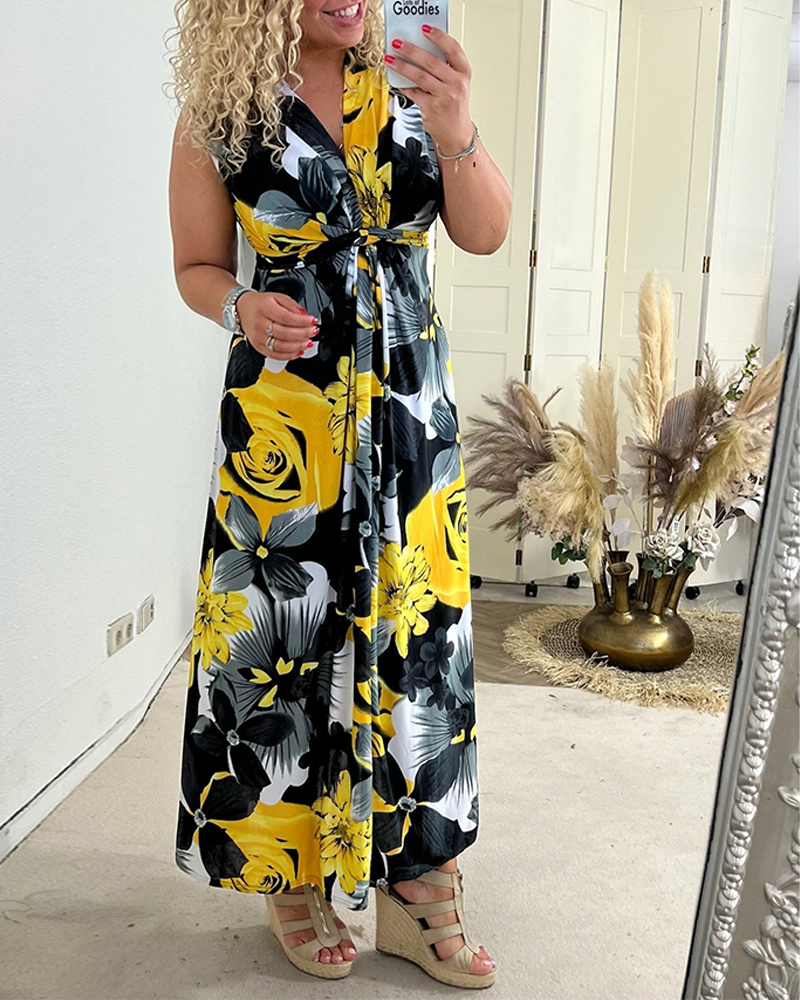 Filippa® | Elegant ærmeløs kjole med plisseret blomsterprint