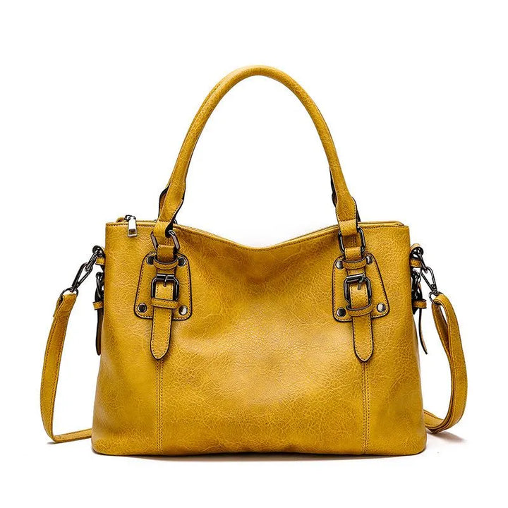 BIRK® | ELEGANT TASKE I LÆDER