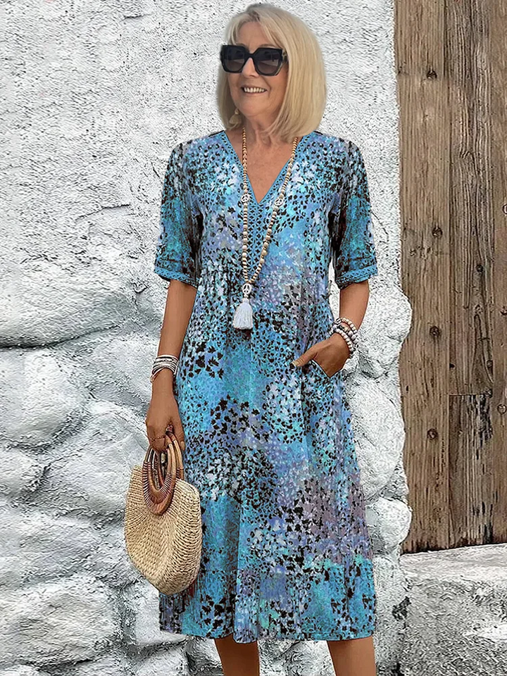 Trille® | ELEGANT BLOMSTRET MIDI KJOLLE MED MAVE-DÆKKENDE PASFORM