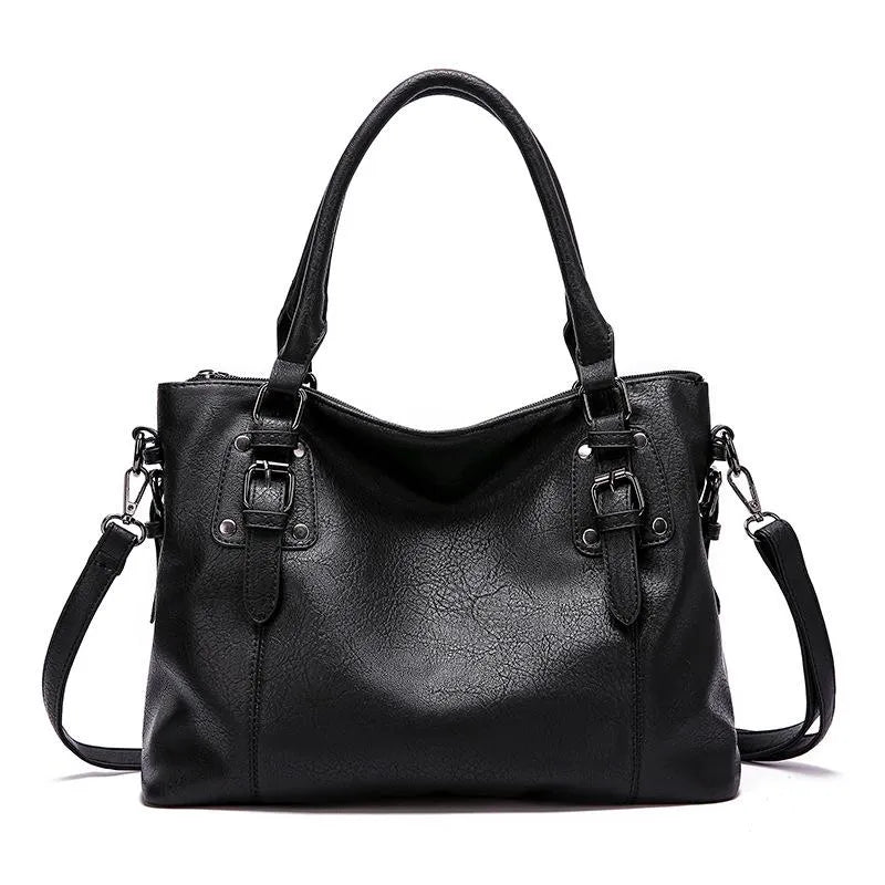 BIRK® | ELEGANT TASKE I LÆDER
