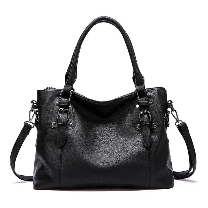 BIRK® | ELEGANT TASKE I LÆDER